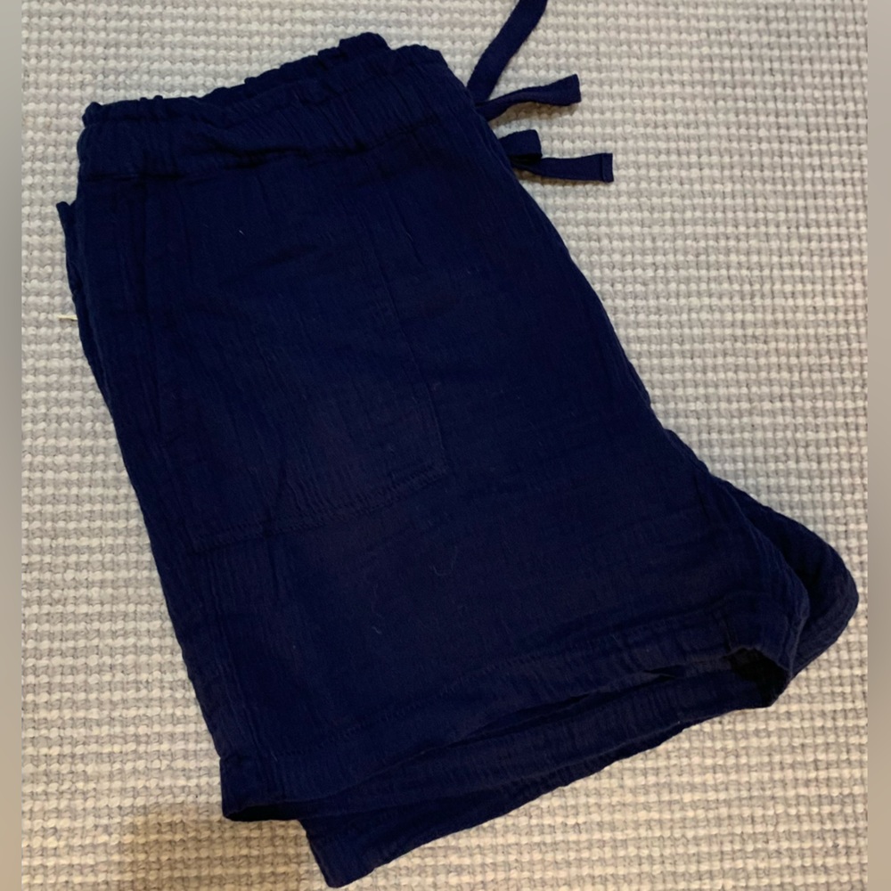 New blue shorts with front and back pockets